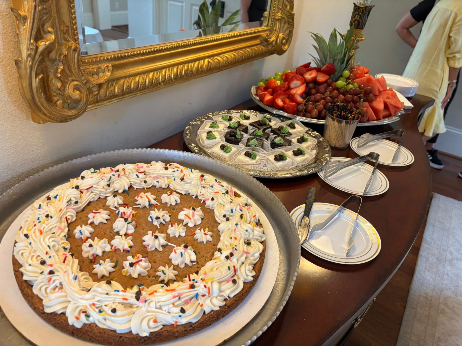 Giant chocolate chip cookie cake with buttercream rosettes