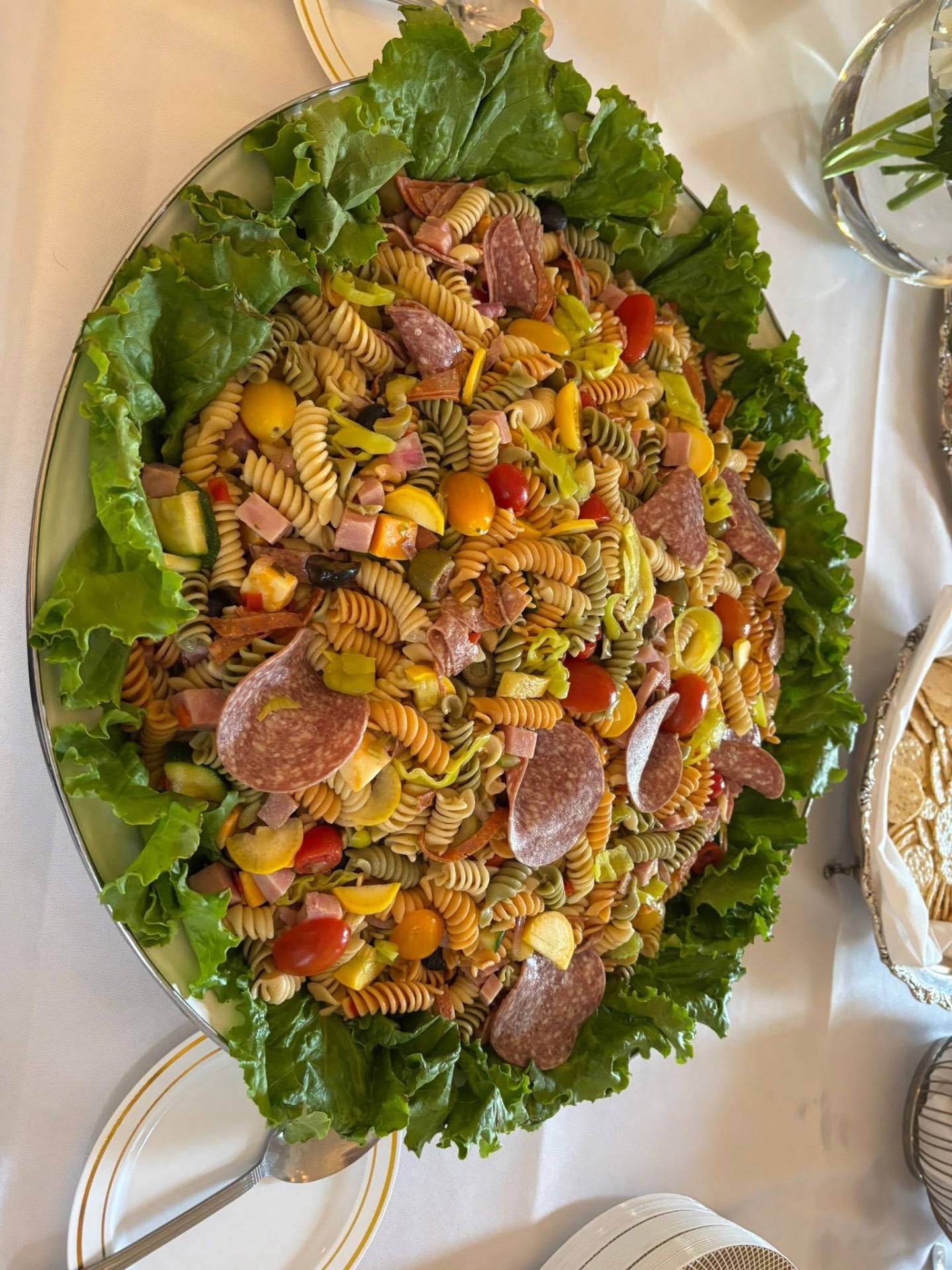 Large platter of tri-color Italian pasta salad